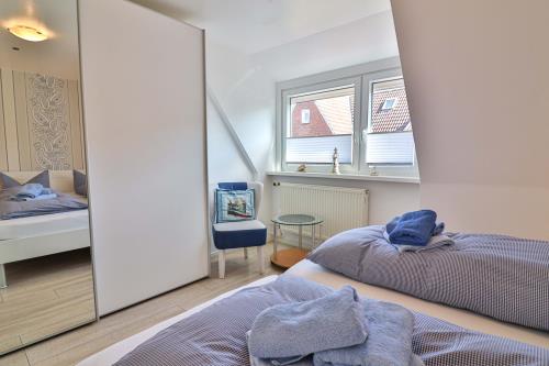 Langeoog Vermietung am Meer – Kiek rin bi Kati - Ferienwohnung 3 - Schlafzimmer 1