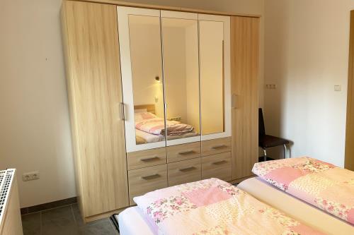 Langeoog Ferienwohnung Haus Krasniqi - 3 - Schlafzimmer 1