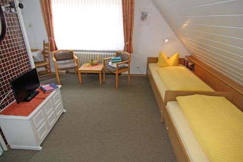 Langeoog Ferienwohnung Haus Numrich - Whg. 3 - Schlaf- und Wohnbereich