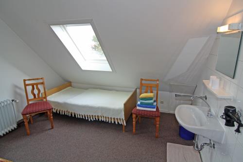 Langeoog Ferienwohnung Haus Numrich - Whg. 4 - Schlafzimmer Einzelbett