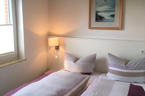 Langeoog Ferienwohnung Haus am Wind / am Strand - 4 - Schlafzimmer 