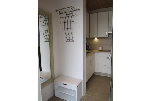 Langeoog Ferienwohnung Haus am Wind / am Strand - 5 - Eingang mit Garderobe