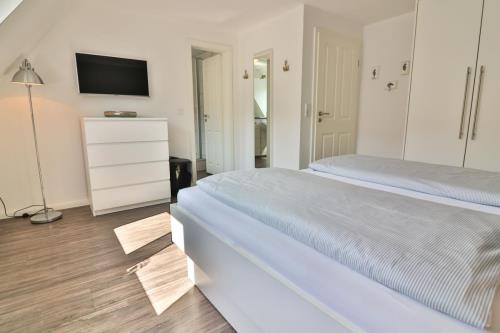 Langeoog Ferienhaus Huus Osterloog - Tüsken Tiden - Tüsken Tiden