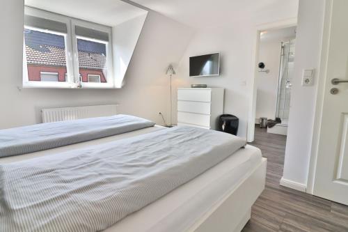 Langeoog Ferienhaus Huus Osterloog - Tüsken Tiden - Tüsken Tiden