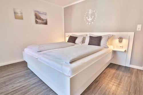 Langeoog Ferienhaus Huus Osterloog - Tüsken Tiden - Tüsken Tiden