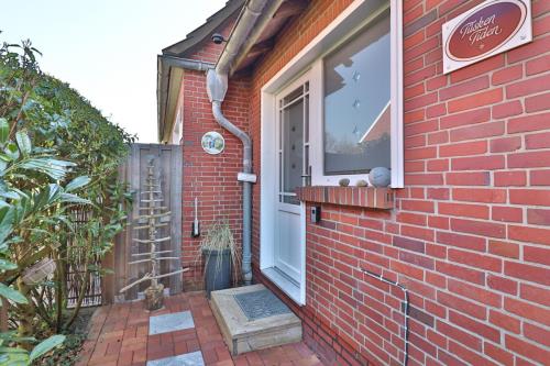 Langeoog Ferienhaus Huus Osterloog - Tüsken Tiden - Tüsken Tiden