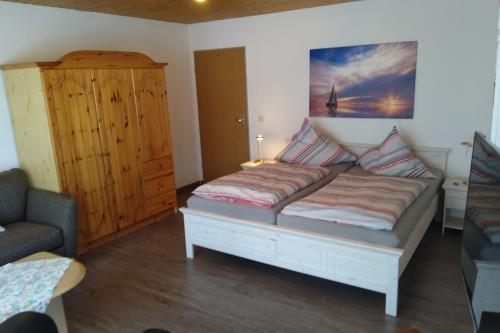 Langeoog Ferienwohnung Im Hasenwinkel - Inselh. - Inselha&#776;schen Wohn- und Schlafzimme