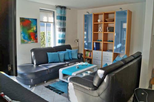 Langeoog Ferienhaus Inselresidenz Seeschwalbe FH**** - Wohnzimmer Paterre