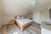 Langeoog Ferienhaus Inselzauber Langeoog FH***** - Schlazfimmer 1 mit Ankleiderraum