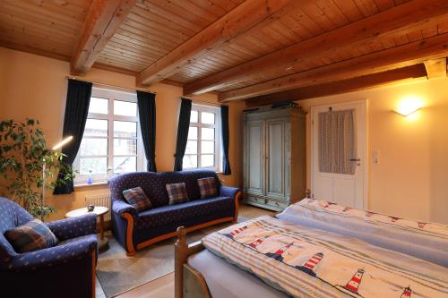 Langeoog Ferienwohnung Insulanerhaus Lüttje Pad 1 Solten Wind  - V 01 - Schlafzimmer 1