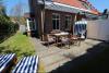 Langeoog Ferienhaus Karkpolder Residenz Haus 3 - Garten des Ferienhauses mit Terasse