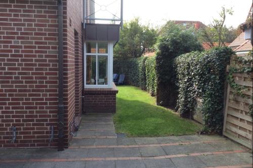 Langeoog Ferienhaus Karkpolder Residenz Haus 3 - Ansicht vom Garten