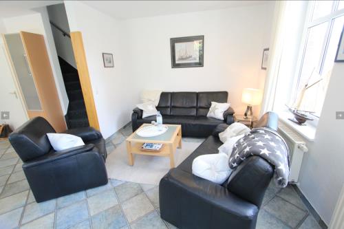 Langeoog Ferienhaus Karkpolder Residenz Haus 3 - Ansicht vom Wohnzimmer Sitzecke