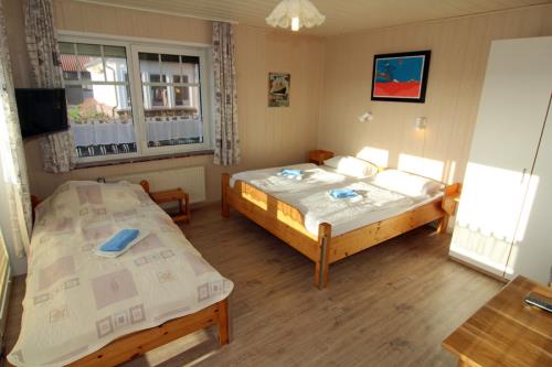 Langeoog Pension Landhaus am Schniederdamm - 8 - Zimmer 8