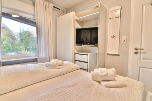 Langeoog Ferienwohnung Vermietung am Meer – Langeooger Viermaster - Blaues Segel - Schlafzimmer