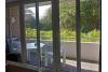 Langeoog Ferienwohnung Langeooger Jahreszeiten - Studio: Blick zu Balkon und Garten