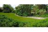 Langeoog Ferienwohnung Langeooger Jahreszeiten - Blick vom Balkon in die Gartenanlage