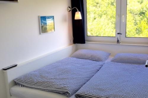 Langeoog Ferienwohnung Us Langeoog - Loog 53°N - Schlafzimmer 1