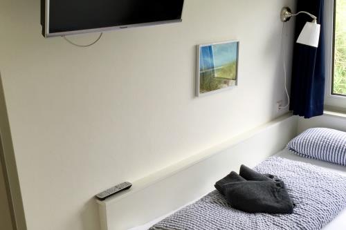 Langeoog Ferienwohnung Us Langeoog - Loog 53°N - Schlafzimmer 1