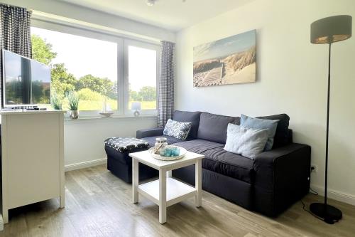 Langeoog Ferienwohnung Us Langeoog - Loog 53°N - Wohnbereich