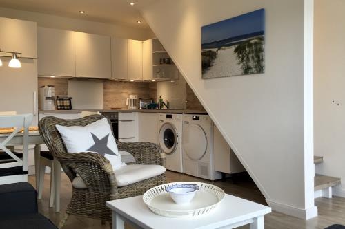 Langeoog Ferienwohnung Us Langeoog - Loog 53°N - Wohn- und Essbereich