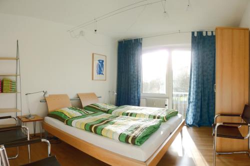 Langeoog Ferienwohnung Margit u. Alexander Steinbüchel - M. u. A. Steinbüchel - Schlafraum 1 von 3