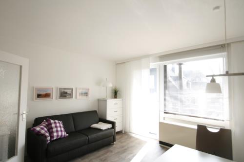 Langeoog Ferienwohnung Us Langeoog - Meertied - Wohnzimmer