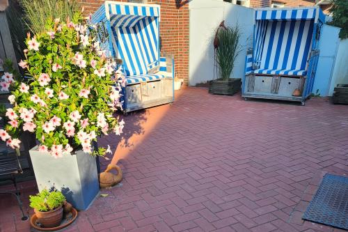 Langeoog Ferienwohnung Muschelsöker - -Unsere Strandkorbecke zum relaxen-