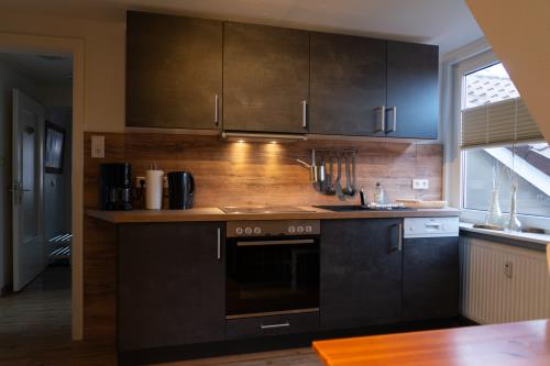 Langeoog Ferienwohnung Muschelsöker - KREBS & KRABBE - Küche KREBS