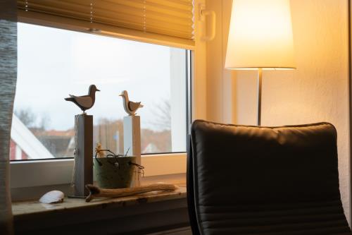 Langeoog Ferienwohnung Muschelsöker - KREBS & KRABBE - Wohnzimmer KRABBE