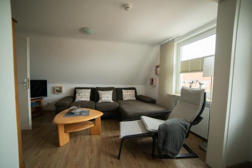 Langeoog Ferienwohnung Muschelsöker - KREBS & KRABBE - Wohnzimmer KRABBE