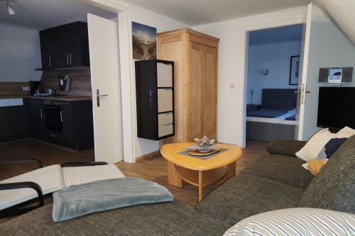 Langeoog Ferienwohnung Muschelsöker - KREBS & KRABBE - Wohnzimmer KRABBE