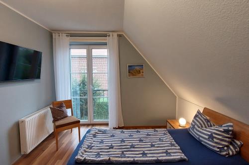 Langeoog Ferienhaus Residenz Inseltraum (Doppelhaushälfte) - Doppelschlafzimmer OG anderer Blick