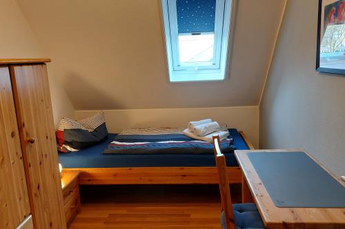 Langeoog Ferienhaus Residenz Inseltraum (Doppelhaushälfte) - 2. gemütliches Einzelzimmer OG