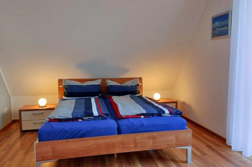 Langeoog Ferienhaus Residenz Inseltraum (Doppelhaushälfte) - Schlafen unter'm Dach/ smart-TV