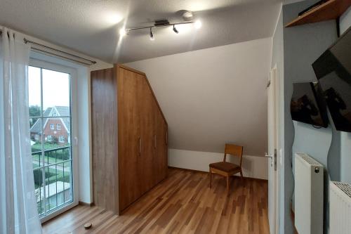 Langeoog Ferienhaus Residenz Inseltraum (Doppelhaushälfte) - Schlafen unter`m Dach anderer Blick