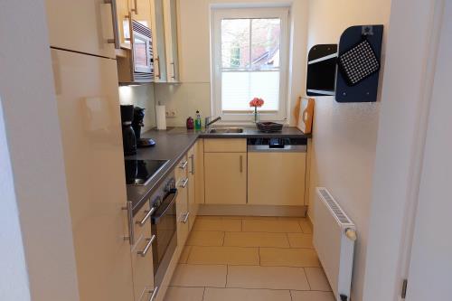 Langeoog Ferienhaus Residenz Inseltraum (Doppelhaushälfte) - Gut ausgestattete Küche