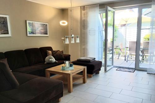 Langeoog Ferienhaus Residenz Inseltraum (Doppelhaushälfte) - gemütliches und geräumiges Wohnzimmer