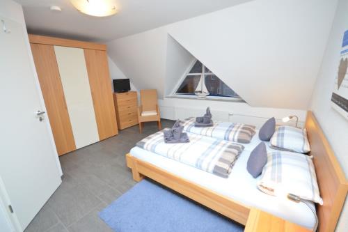 Langeoog Ferienhaus Residenz Otzum FH***** - Angula - Haus Angula - Doppelschlafzimmer, 1.OG