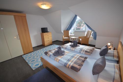 Langeoog Ferienhaus Residenz Otzum FH***** - Mero - Haus Mero - Doppelschlafzimmer, 1.OG