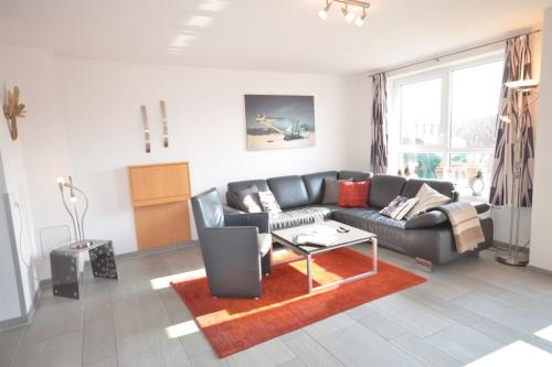 Langeoog Ferienhaus Residenz Süderdünenring FH***** - Dorada - Haus Dorada - Wohnbereich, EG