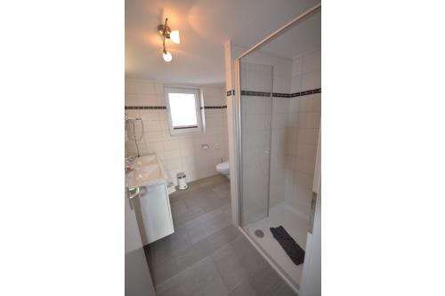 Langeoog Ferienhaus Residenz Süderdünenring FH***** - Dorada - Haus Dorada - Bad, 1.OG