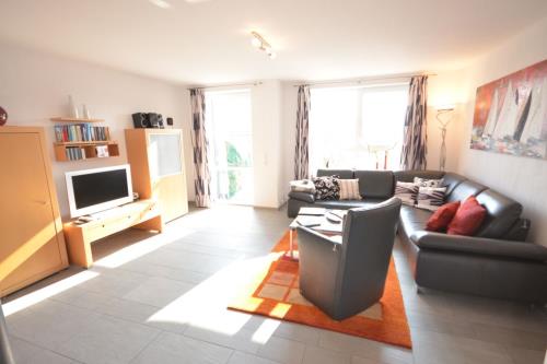 Langeoog Ferienhaus Residenz Süderdünenring FH***** - Lubina - Haus Lubina - Wohnbereich, EG
