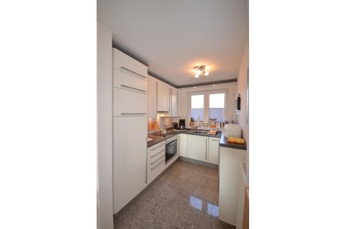 Langeoog Ferienhaus Residenz Süderdünenring FH***** - Merluza - Haus Merluza - Küche, EG