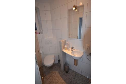 Langeoog Ferienhaus Residenz Süderdünenring FH***** - Merluza - Haus Merluza - WC, EG