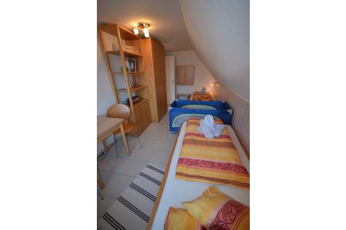 Langeoog Ferienhaus Residenz Süderdünenring FH***** - Merluza - Haus Merluza - &quot;Kinderschlafzimmer&quot; 1.OG
