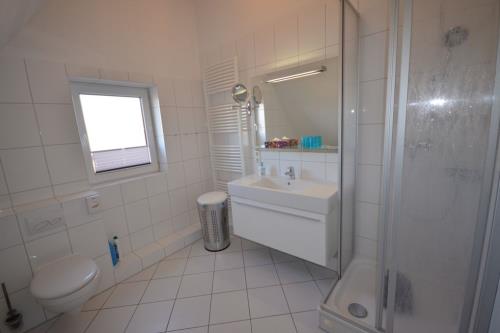 Langeoog Ferienhaus Residenz Süderdünenring FH***** - Merluza - Haus Merluza - Bad, 2.OG