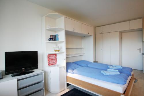 Langeoog Ferienwohnung Us Langeoog - Strandburg - Wohn/Schlafbereich