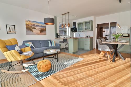 Langeoog Ferienwohnung Vermietung am Meer – Strandleben - Wohnzimmer
