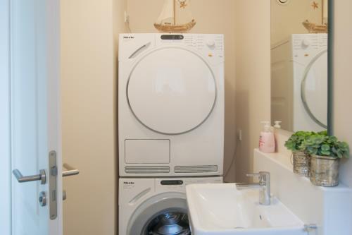 Langeoog Ferienhaus Strandvillen Langeoog - Hus in Lee - Hus in Lee, EG: Funktionsraum, Gäste WC